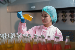 Inspector monitors production lines