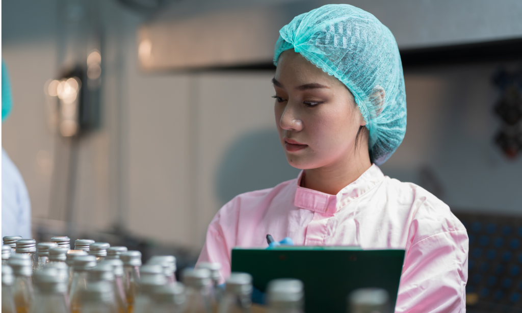 An inspector checking the quality of the products