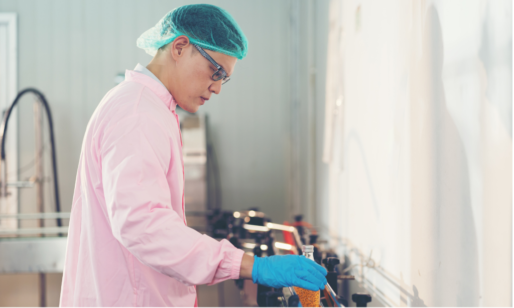 An inspector checking the quality of the products